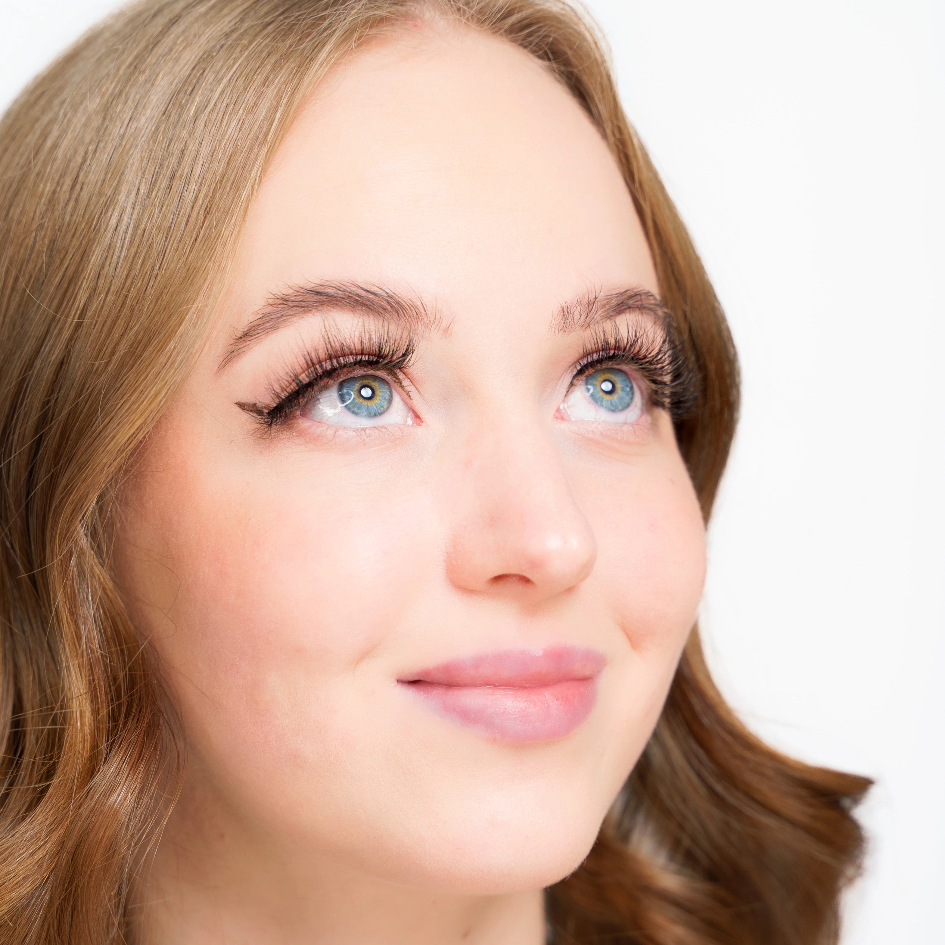 bright lashes on blue eyes looking up